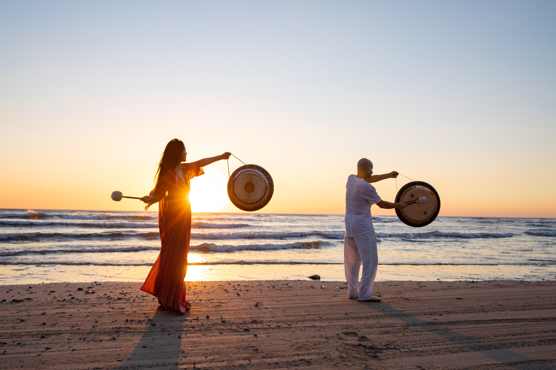 Shanti_on_beach_with_gongs